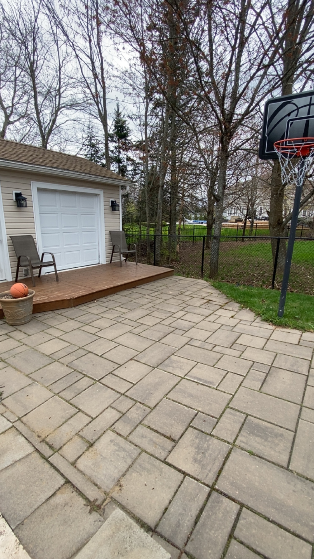 Same paver patio cleaned and restored after pressure washing